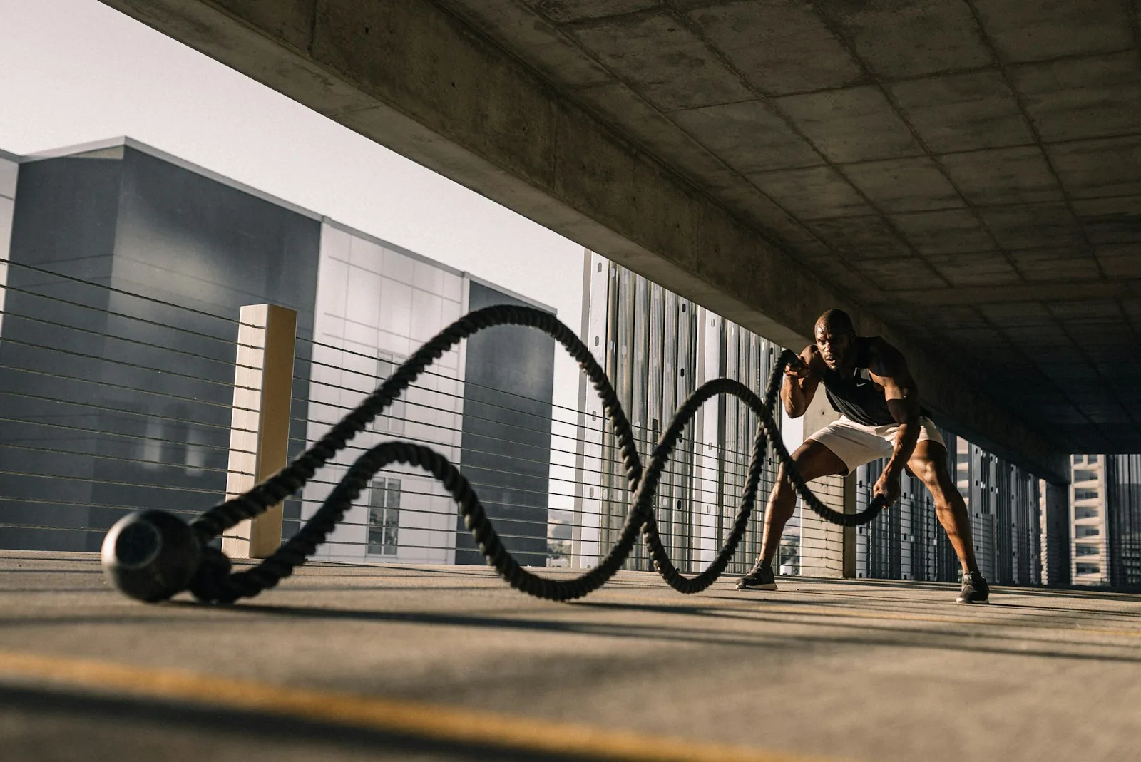 Athlete working with battle ropes